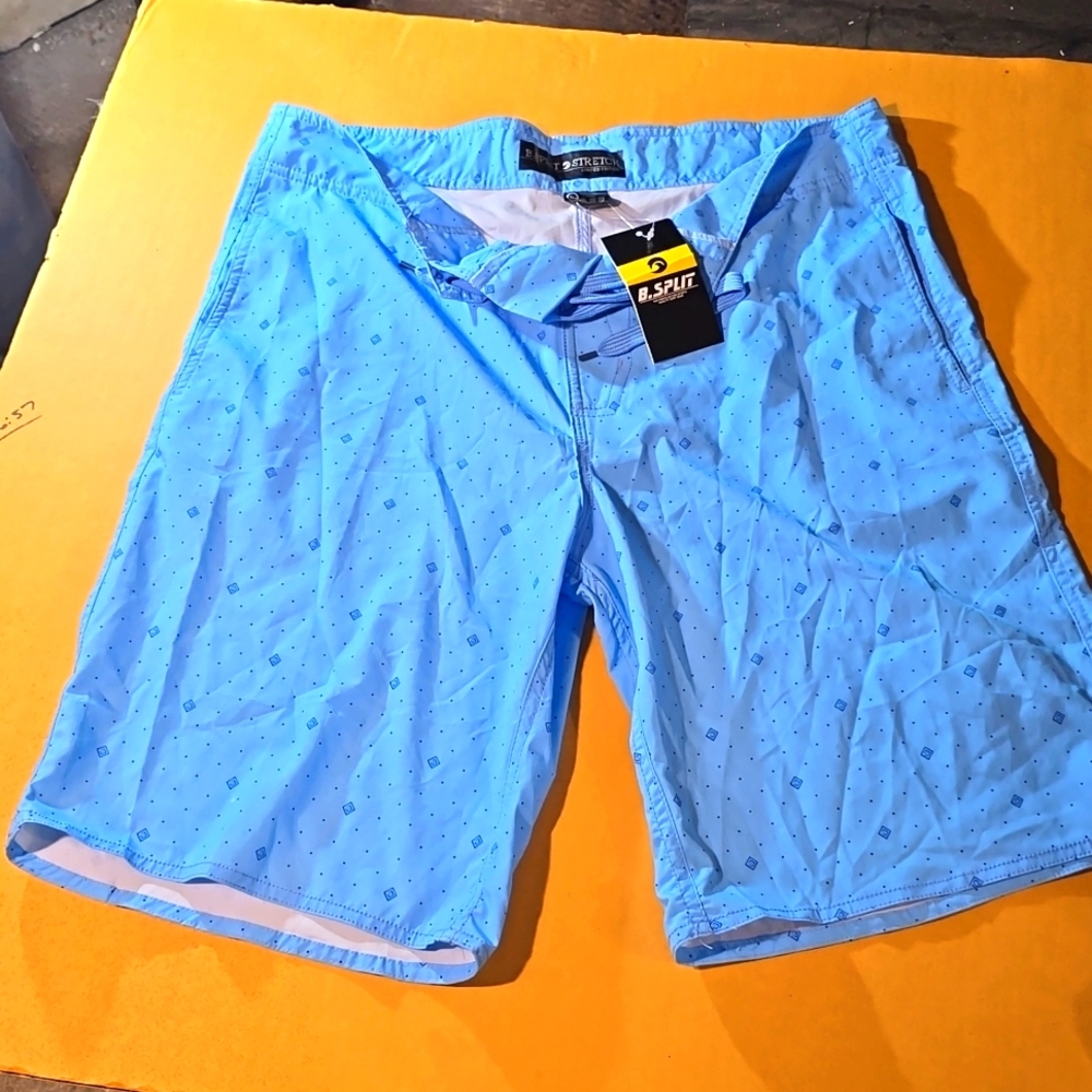 B. SPLIT swimming trunks. Mens large